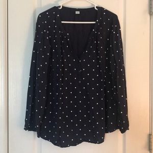 Navy blue and white polka dot blouse